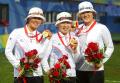 图文-[奥运]女子射箭团体决赛 三位韩国姑娘展示金牌