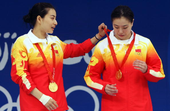 图文-女子双人3米跳板决赛 郭晶晶为队友整理