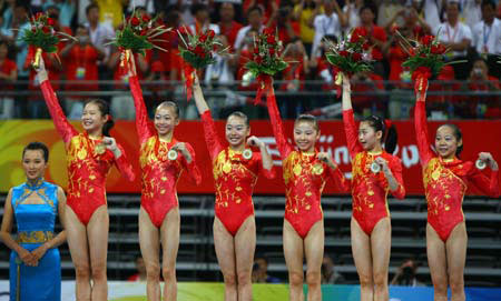 Chinese women gymnasts claim first Olympic team crown 