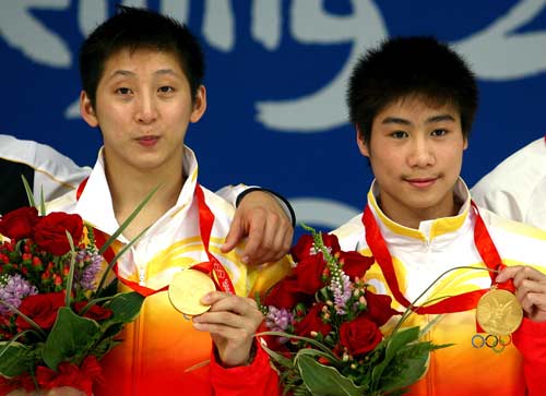 Photo: Chinese men win 10m Synchronized Diving gold