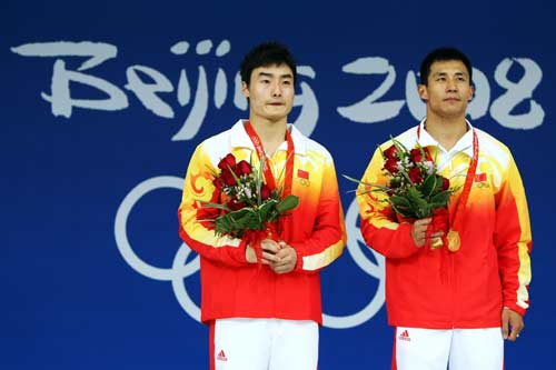 Photos: Chinese Wang/Qin win Men's 3m Springboard Synchronized Olympic gold