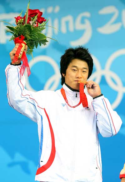 Photo: Sa Jae-hyouk of ROK wins Men's 77kg Weightlifting gold