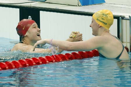 Photo:Liu wins women's 200m butterfly gold in world record time