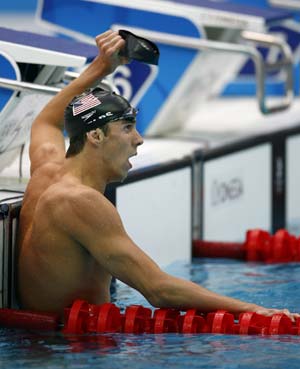 Photo: Phelps breaks world record to win men's 200m individual medley 