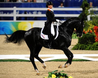 Photos: Anky van Grunsven of the Netherlands gets gold