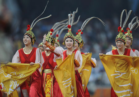 Photo: Dancers perform before track and field events