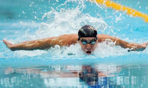Phelps gana medalla de oro en 100 metros mariposa en Beijing 