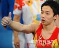 图文-中国队夺得体操男团冠军 小将邹凯很开心