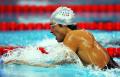 图文-9日奥运会游泳预赛比赛 意大利选手搏击浪花