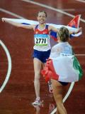  Photo and text - Kaniskina wears the national flag in the women's 20km track and field walking final