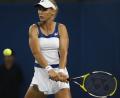 图文-网球女子单打11日赛况 杰缅季耶娃全力回球