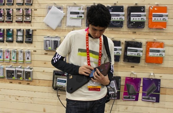 Give an a two-stinted bowed instrument with a lower register than Jingo next