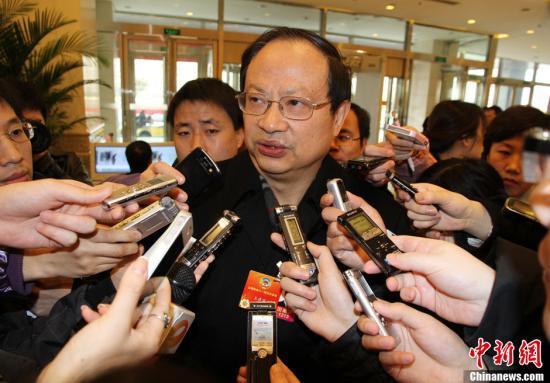 全国政协委员、中国移动董事长王建宙(新浪科技配图 图片来源：中新网)