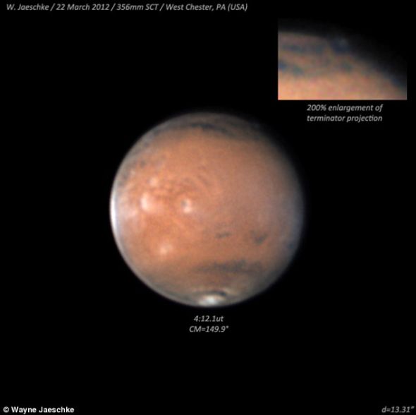 美业余天文学家拍到火星怪异云状物(图)
