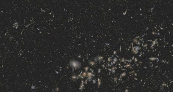 科学家们合成了一段基于数据的3D宇宙的假想飞行视频，这幅图正是其中的一帧视频截图。其中羽毛般的亮点便是观察者所能看到的一个个星系
