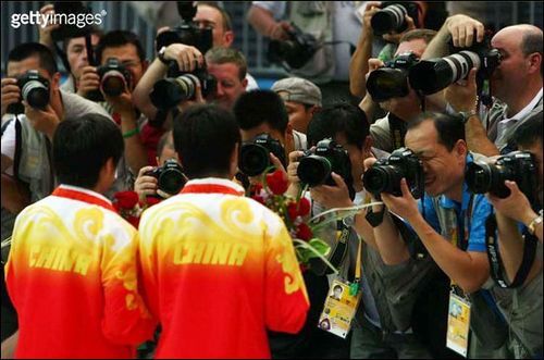 奥运报道谁作主 体育摄影记者装备揭秘_数码