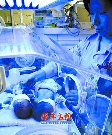 产妇生下三胞胎取名奥奥运运会会(图)