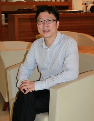 专访潮宏基副总裁董秘徐俊雄