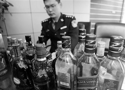 警方查获假酒。资料图