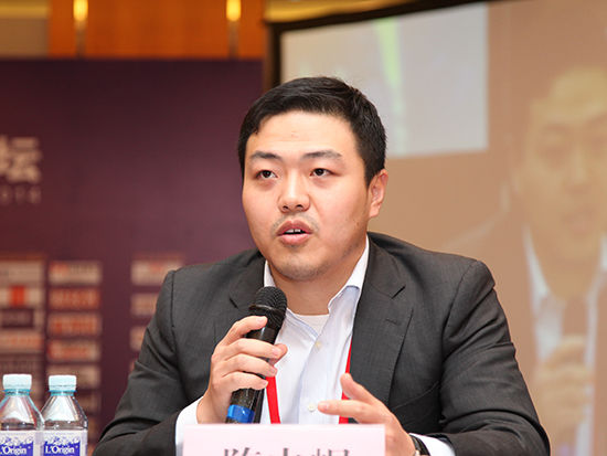 “2014中国金融论坛”于5月14日－15日在北京召开。图为贝恩投资有限公司执行董事陈中崛。（图片来源：新浪财经）