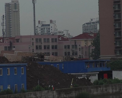 上海塌楼事件追踪:律师认为应按现行价格