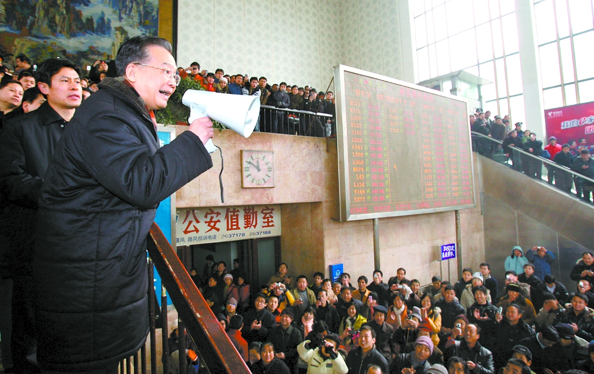 温家宝:一定把大家送回家过春节_焦点透视