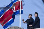 NK weeps, world wary