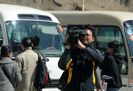 19家境内外媒体赴藏采访拉萨暴力事件经过(图)