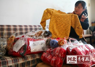 为孤儿织毛衣