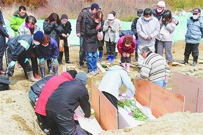 日本大地震已确认造成9099人死亡