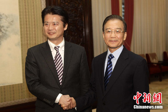 11月23日，中国国务院总理温家宝在北京中南海紫光阁会见日本国外务大臣玄叶光一郎。中新社发 盛佳鹏 摄