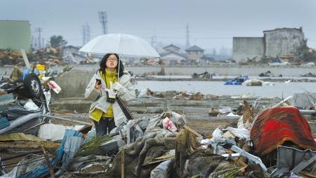 　　3月15日华西都市报记者朱丹冒雨在仙台采访