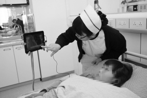 患者边做血透边玩免费电脑 中大医院新病房楼