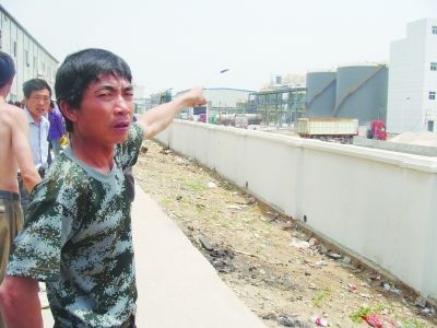 发生事故的化工厂，民工所指就是毒气泄漏地点。