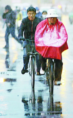 甘肃大部昨现雨雪天气兰州气温降至-4℃(组图)
