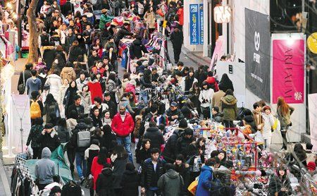 韩国迎来农历春节商机 中国游客纷至消费大手