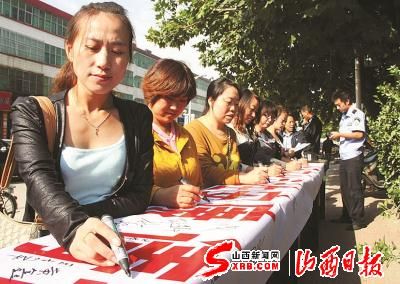 万荣县举行全国餐饮,用药安全月活动(图)