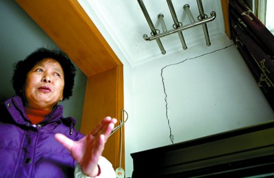 楼房地基沉降墙体开裂开发商称在安全范围内