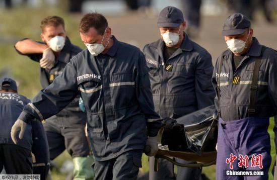 欧安组织:马航坠机169具遇难者遗体被运上火车