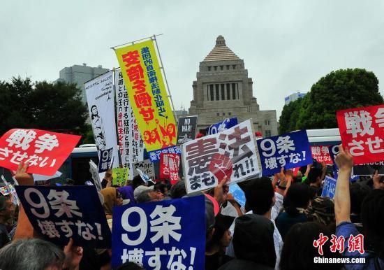 日本执政党称抗议集会不影响安保法案审议日本安保