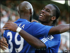 Drogba and Anelka embracing after a goal