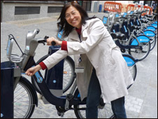 yang li at a bike docking station 