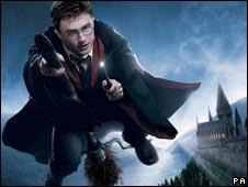 Harry Potter (Daniel Radcliffe) flying on a broomstick