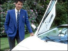 A high-flying businessman with a flash car