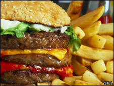 A large hamburger and chips