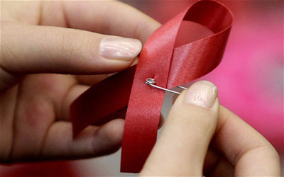 Foreigners will be offered treatment for Aids and HIV on the NHS for the first time.