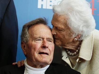 1-Former U.S. president George H.W. Bush and his wife