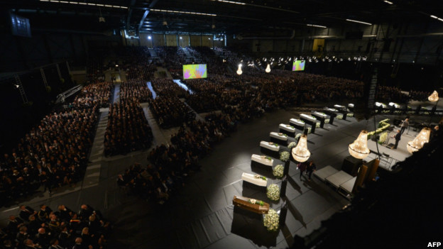 A huge memorial service for 15 children and two adults in the Soeverein Arena in Belgium.