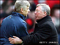 Alex Ferguson consoles Arsene Wenger after the game