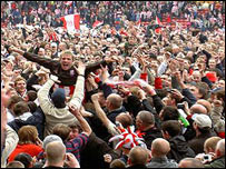 Liam Lawrence celebrates with Stoke City fans (Photo from BBC Stoke and Staffordshire website)